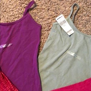 Buckle Tops - Three new tank tops and one like new! Buckle Tops - Three new tank tops and one like new!